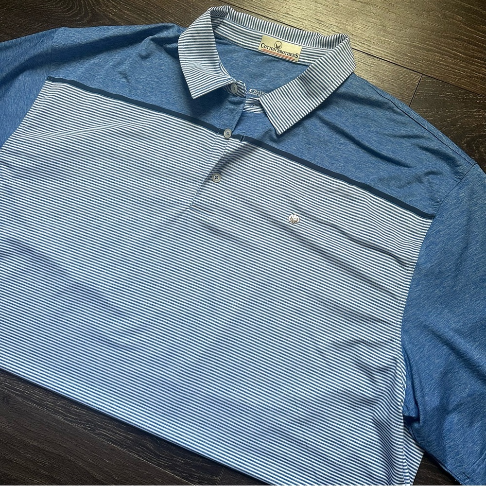 Classic Blue and White Striped Polo by Greg Norman